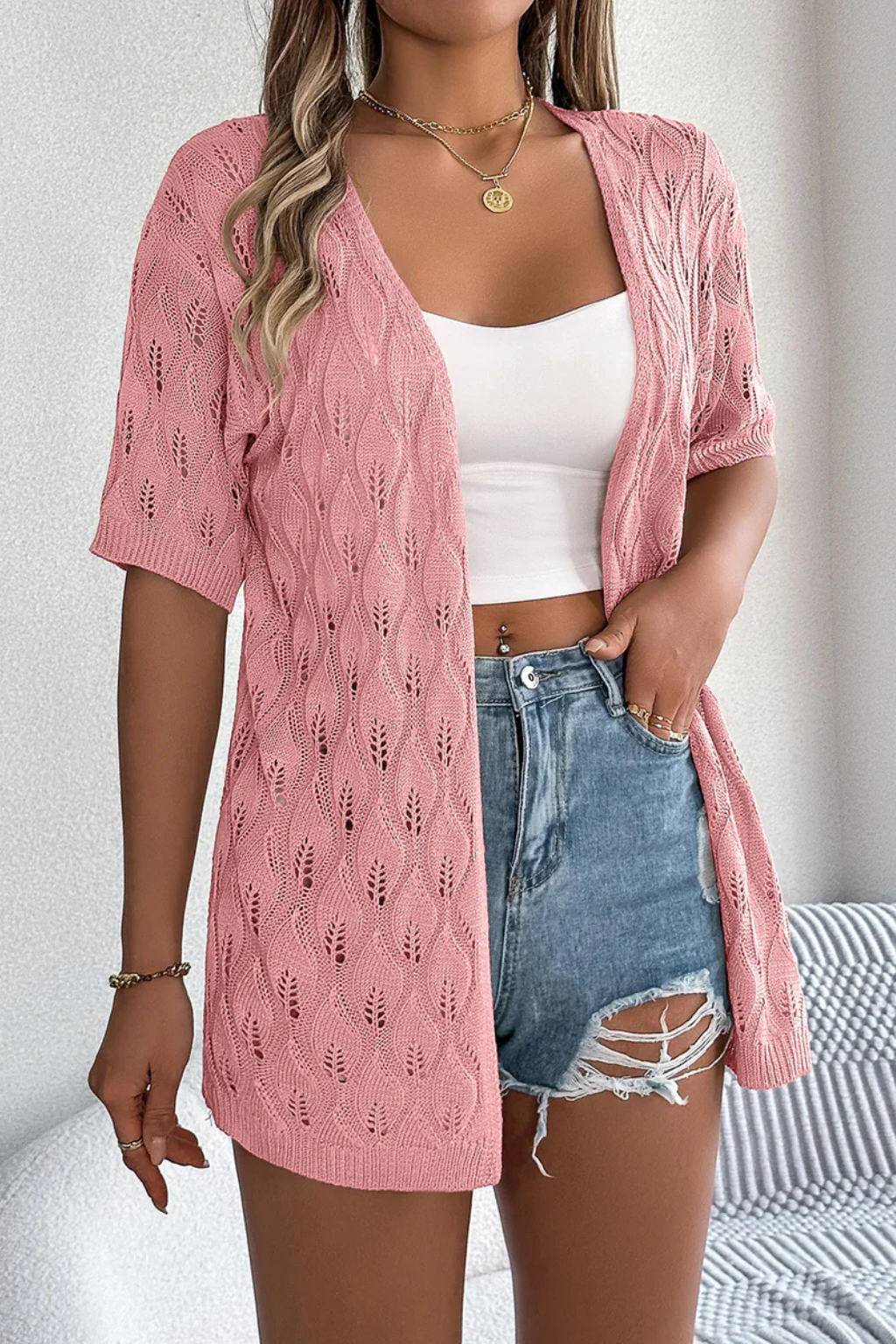 Relaxed fit women's short sleeve crochet cardigan, lightweight, casual & elegant for spring/summer layering.