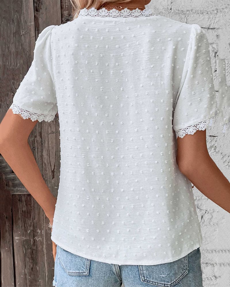 Feminine V-neck blouse for women, lightweight & airy for chic summer fashion.