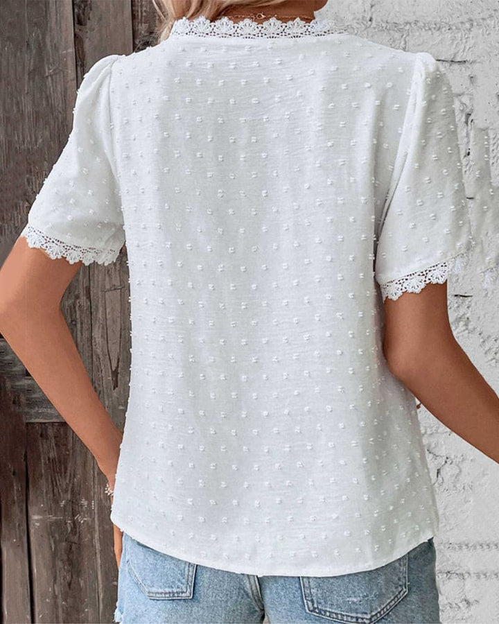 Feminine V-neck blouse for women, lightweight & airy for chic summer fashion.