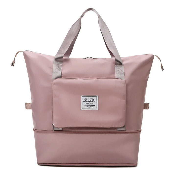 Stylish women's overnight travel bag. Lightweight, waterproof, and expandable for weekend getaways & short trips.