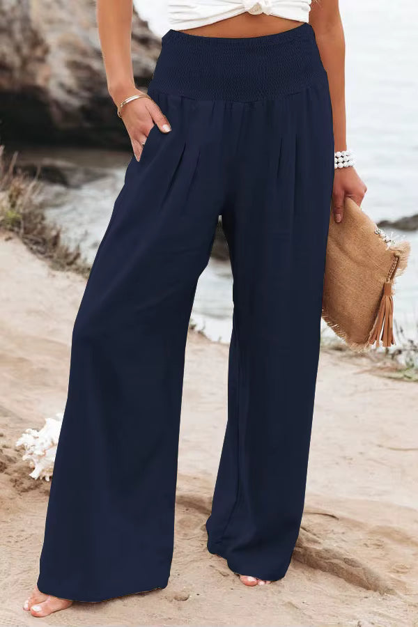 Blue women's breathable linen pants, wide leg design, great for high waist comfort.