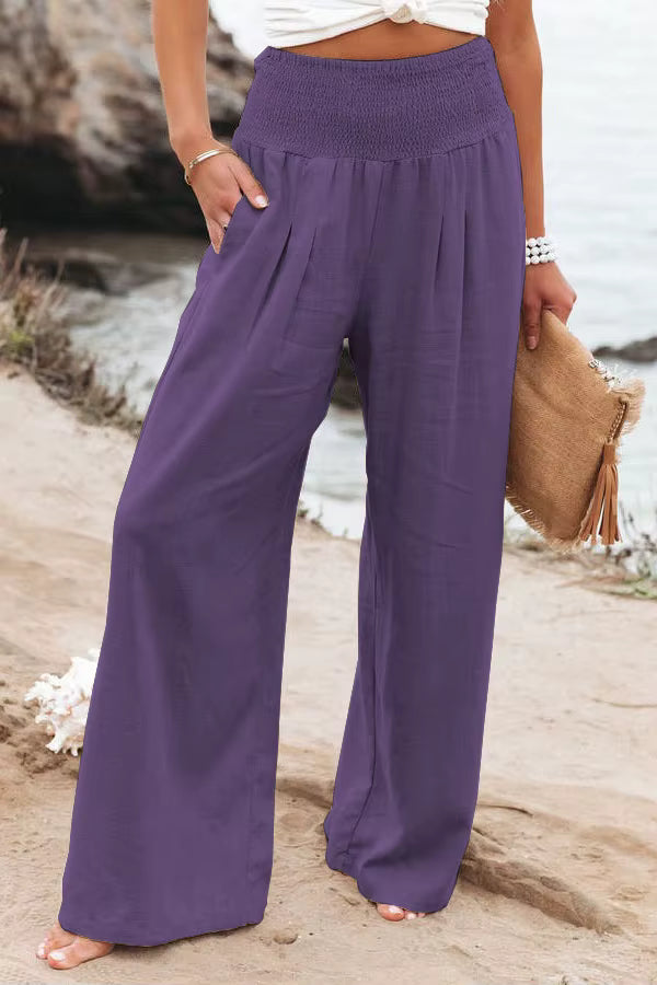Green women's lightweight linen trousers, stylish wide leg for summer casual chic look.