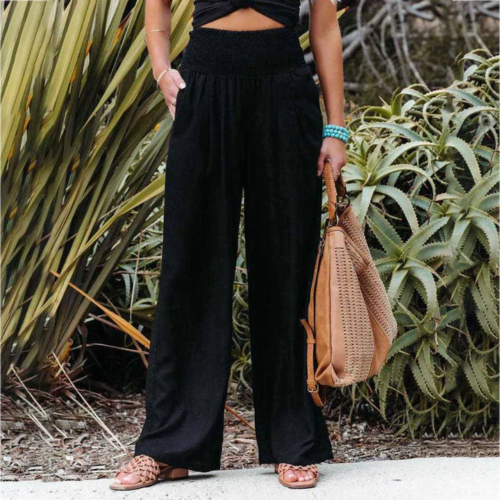 Black women's casual wide leg linen trousers, versatile for elegant summer outfits.