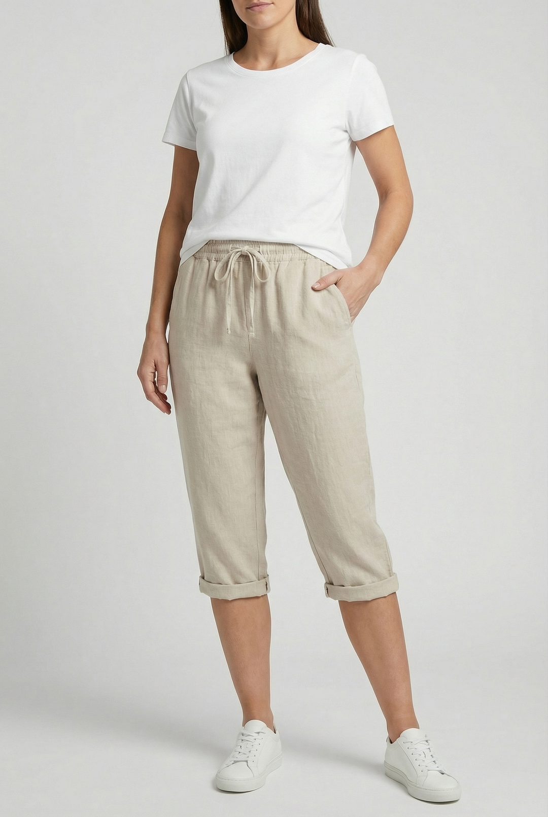 Women's linen capri trousers with elasticated waist, perfect for comfortable summer wear.