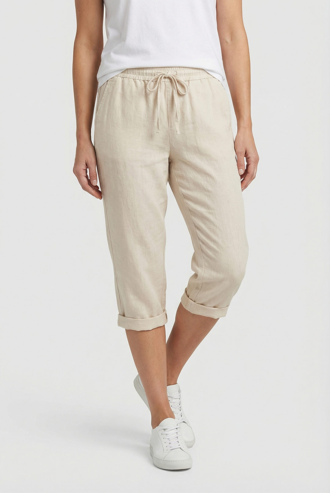 Elegant cropped linen trousers for women, designed for ultimate summer comfort & versatility.
