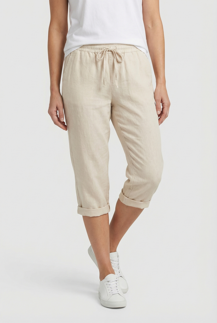 Elegant cropped linen trousers for women, designed for ultimate summer comfort & versatility.