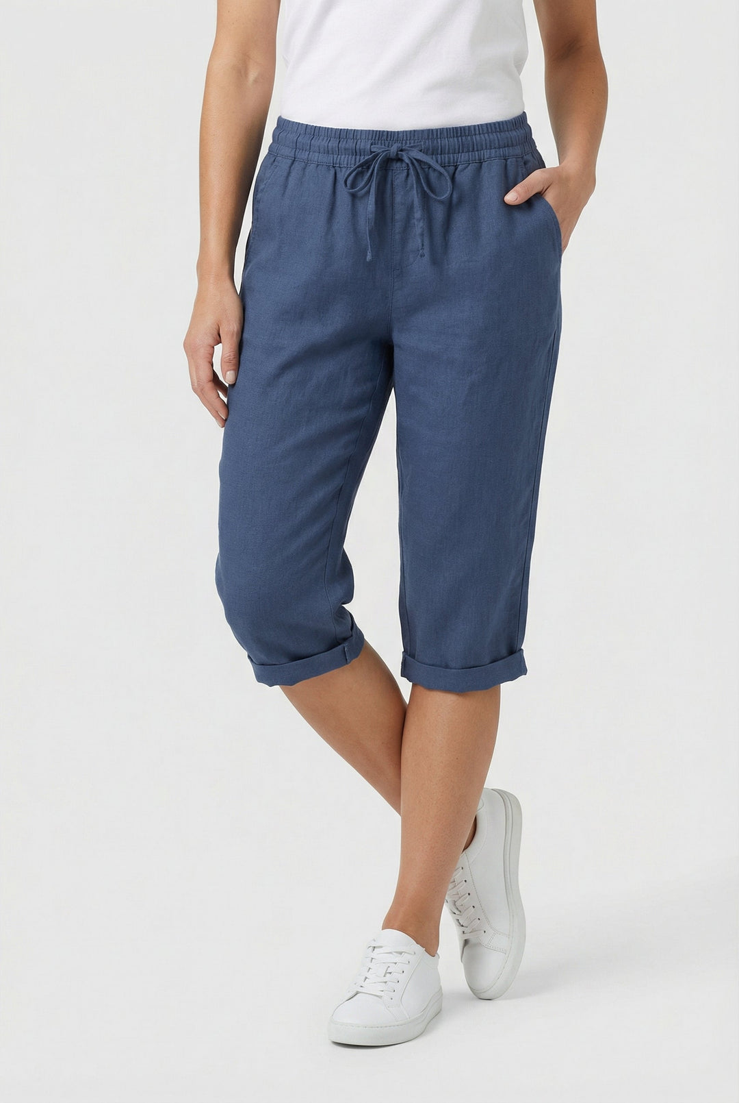 Back view of comfortable women's linen capri pants with elastic waist, perfect for summer casuals.