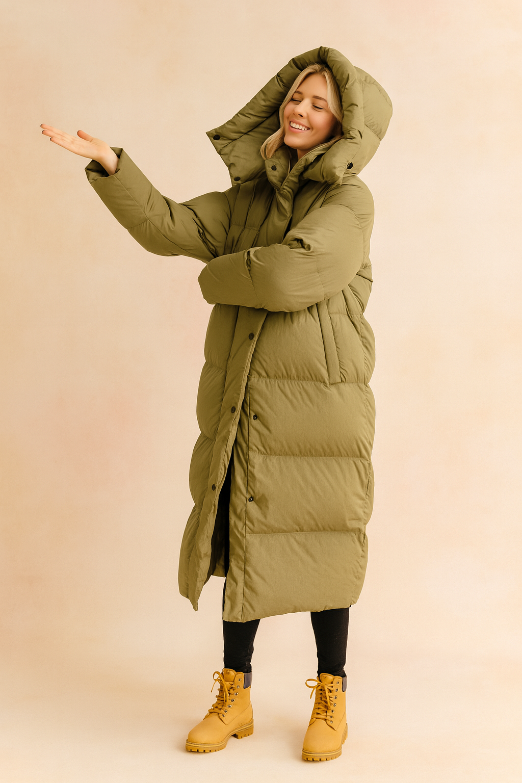 Women's long quilted winter jacket with hood, ideal for cold weather, stylish and warm outerwear.