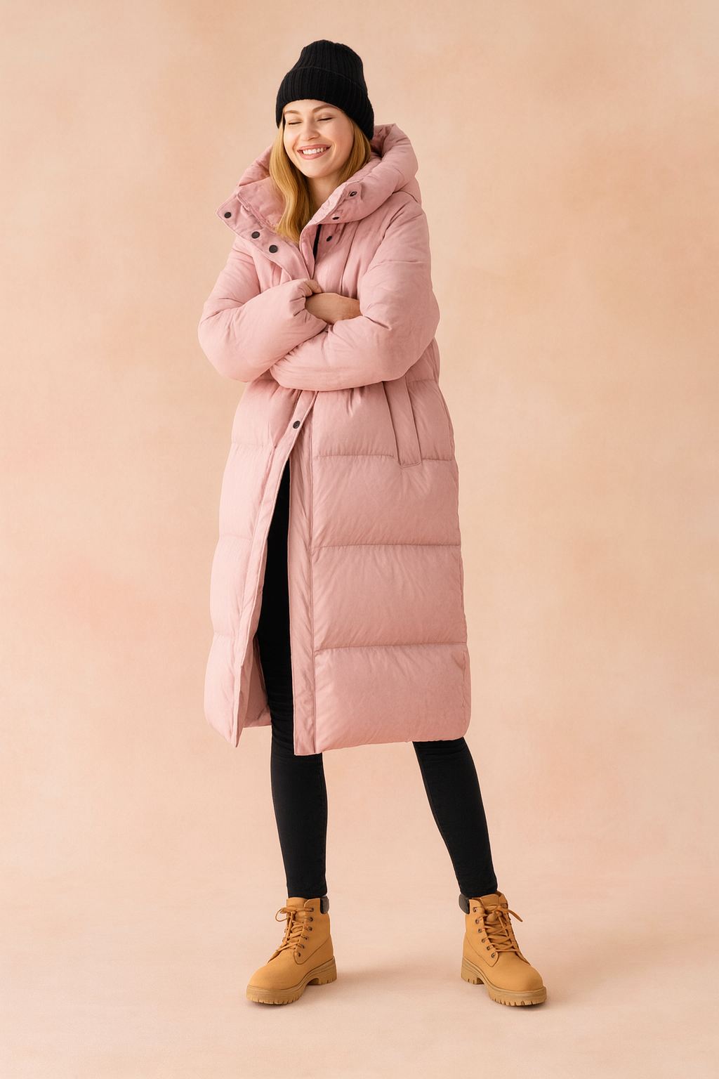 Warm women's hooded long winter coat, quilted for ultimate protection against cold weather & comfort.