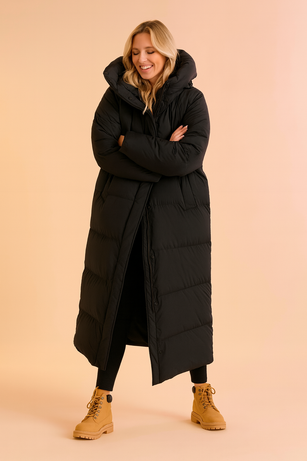 Elegant women's long quilted winter coat, featuring a protective hood, perfect for severe cold weather.