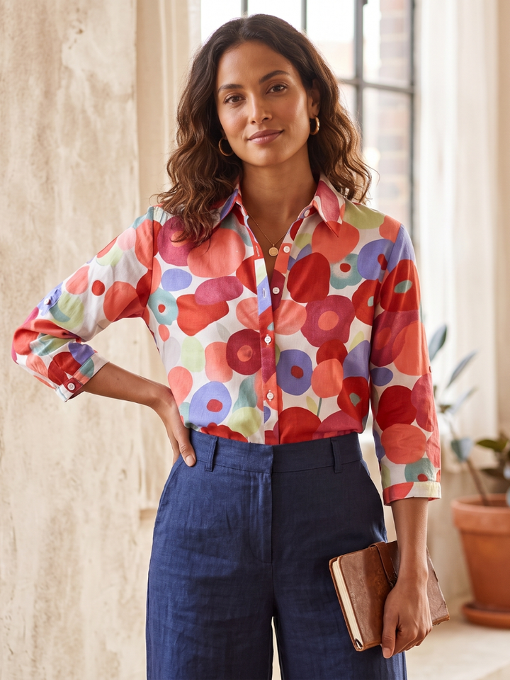 Effortless women's floral button-down top. Versatile long-sleeve blouse for casual outings or office wear.