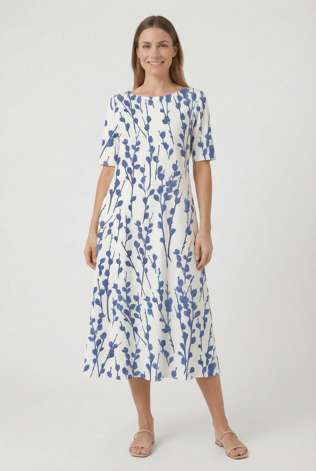 Women's loose fit floral midi summer dress with vibrant print, short sleeves & pockets. Perfect for casual wear.