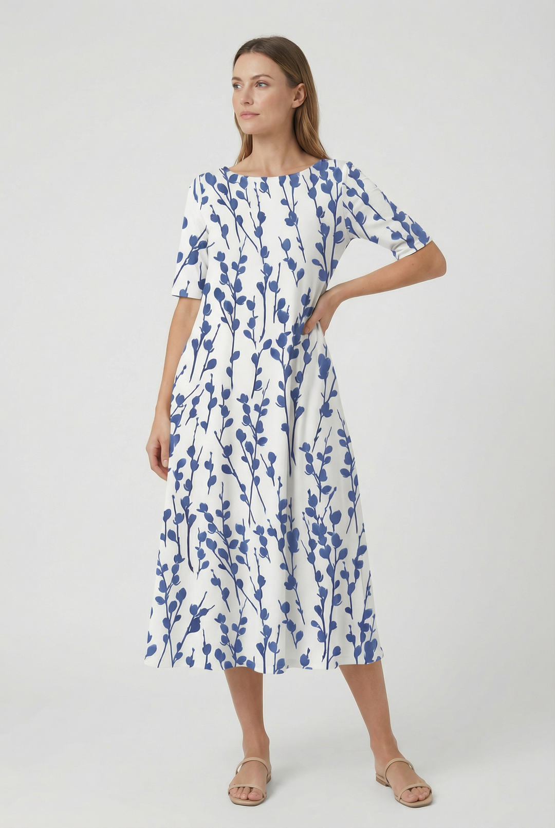 Comfortable women's floral midi dress, relaxed loose fit, short sleeves. Ideal casual summer vacation attire.