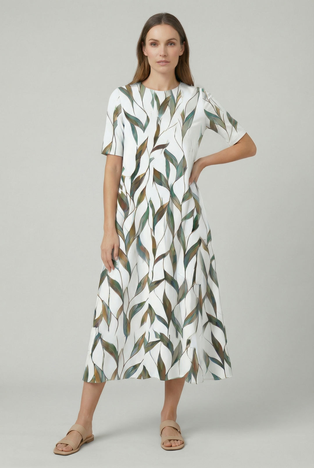 Bohemian-style women's loose fit floral midi dress. Short sleeve, comfortable, perfect for garden parties.