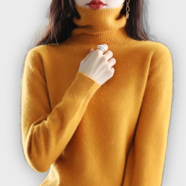 Warm women's roll neck sweater. Comfortable long-sleeve top, perfect for cold weather & autumn.