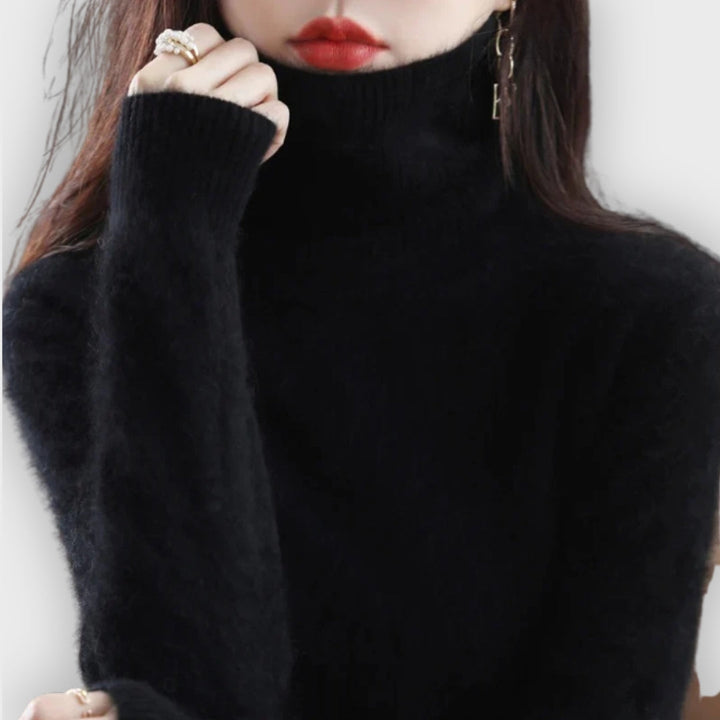 Versatile women's turtleneck sweater. Soft, warm long-sleeve top for autumn & winter fashion.