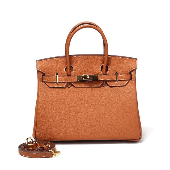 Structured genuine leather handbag, an elegant luxury accessory for women.