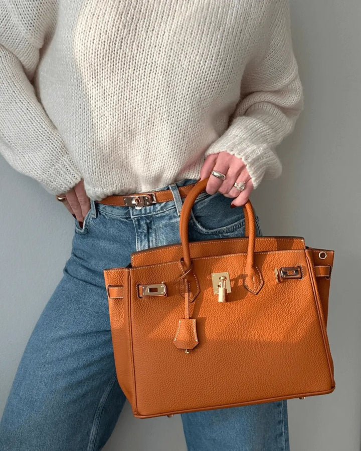 Premium genuine leather shoulder bag, sophisticated and chic for women.
