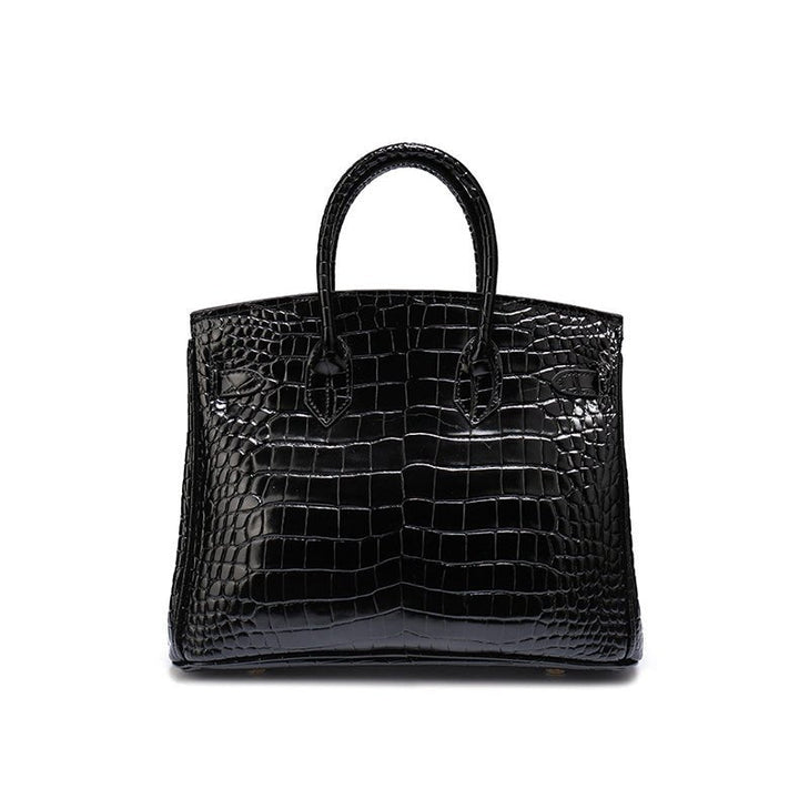Versatile genuine leather shoulder bag, luxury style for daily carry.