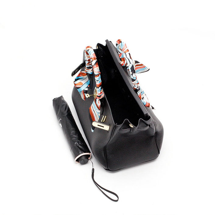 Women's elegant genuine leather purse, a luxury classic for everyday look.