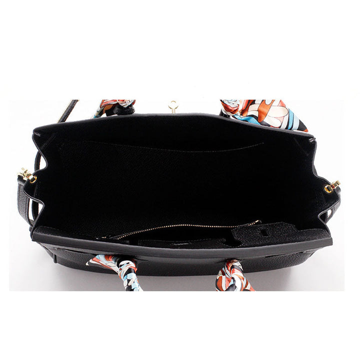 Genuine leather women's handbag, chic accessory with designer appeal.