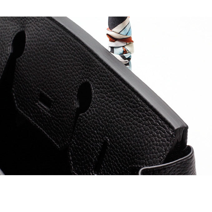 Elegant luxury genuine leather bag, organized for women's everyday style.