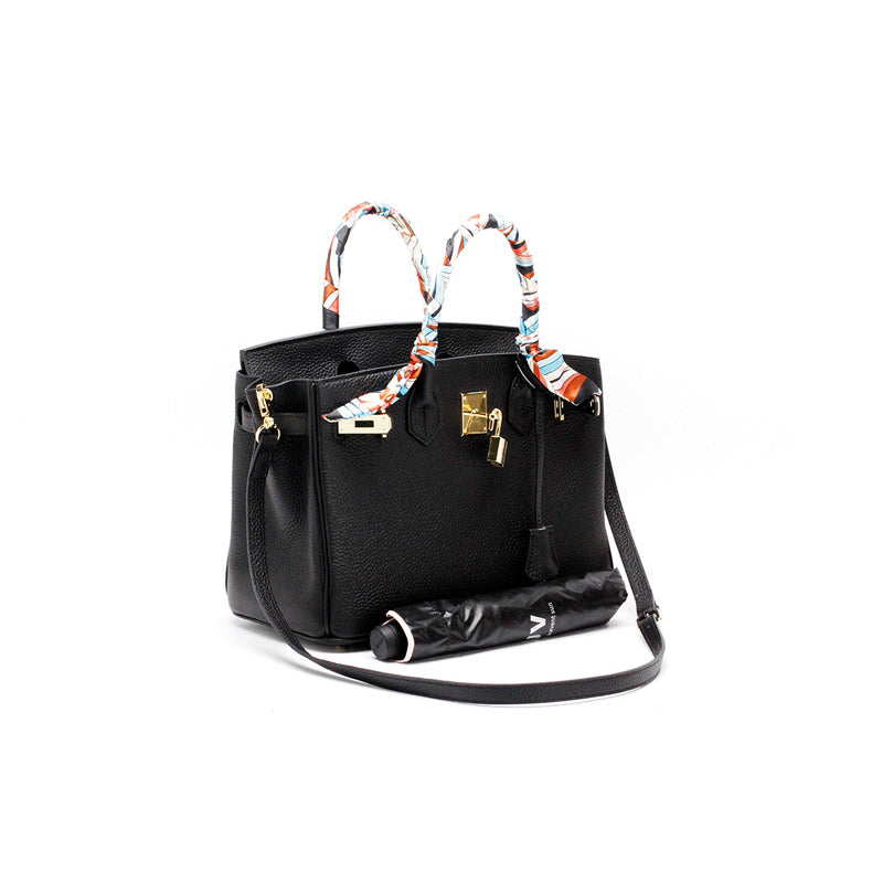 Women's genuine leather luxury handbag, elegant and organized everyday carry.