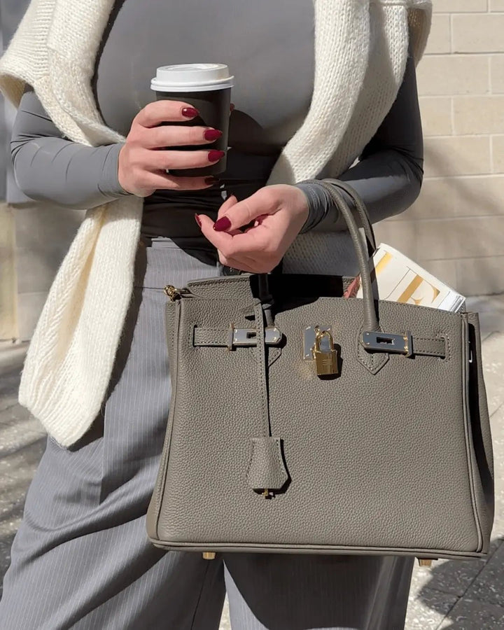 Chic genuine leather shoulder bag, a classic luxury accessory for women's style.