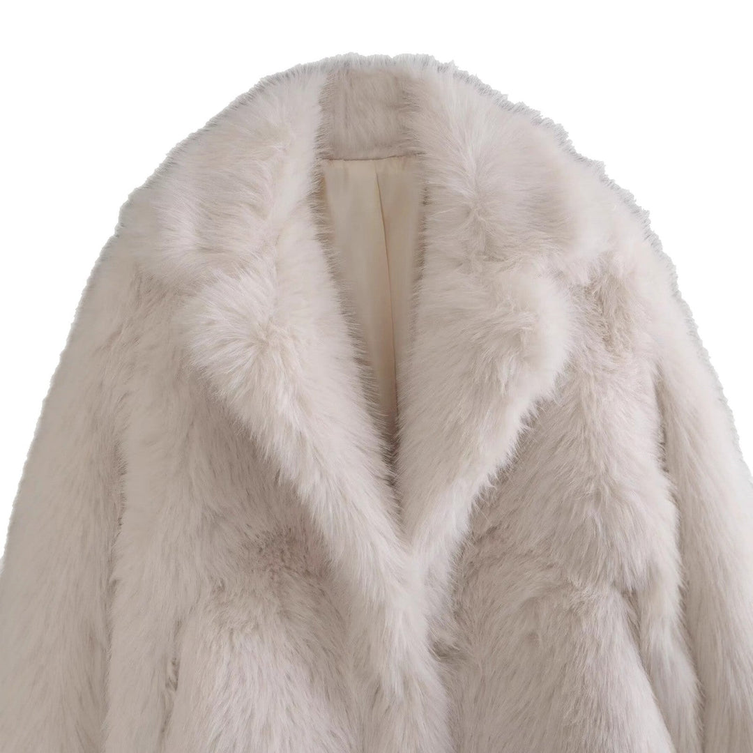 Chic women's off-white luxury winter jacket. Warm, comfortable outerwear for elegant cold-weather style.