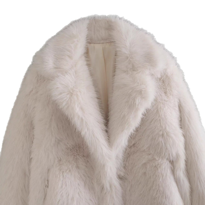 Chic women's off-white luxury winter jacket. Warm, comfortable outerwear for elegant cold-weather style.