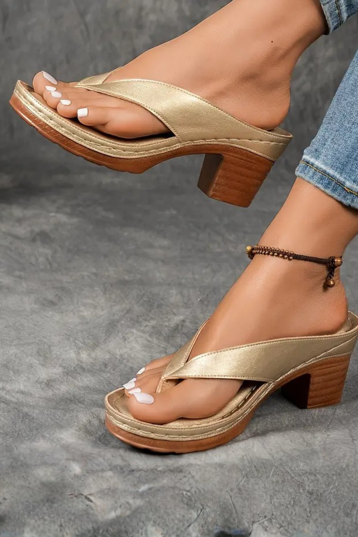 Side view of stylish metallic block heel sandals for women, perfect casual summer footwear.