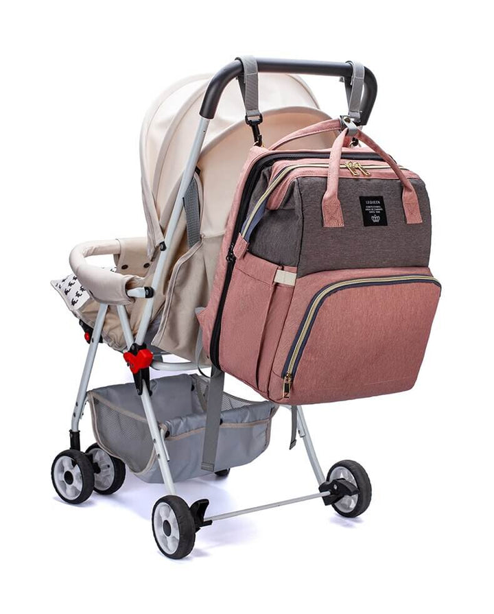 Smart multi-function travel backpack: diaper bag, portable baby bed, and changing station combined.