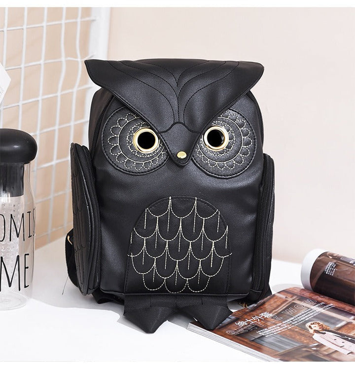 Women's multi-pocket PU leather backpack with cute owl print, perfect for school or casual daily use.