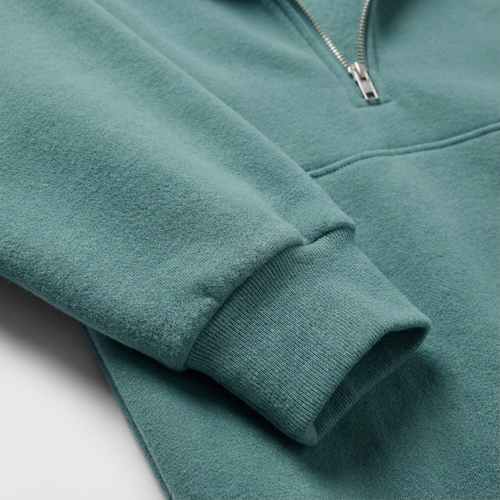 Navy blue women's matching loungewear set, a comfortable half-zip top and joggers, perfect for cozy relaxation.