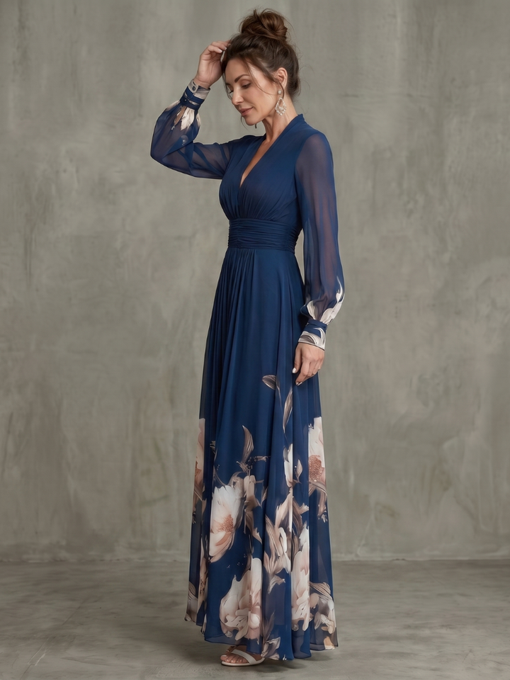 Elegant women's flowy maxi evening gown with pleated details & sheer sleeves for special occasions.