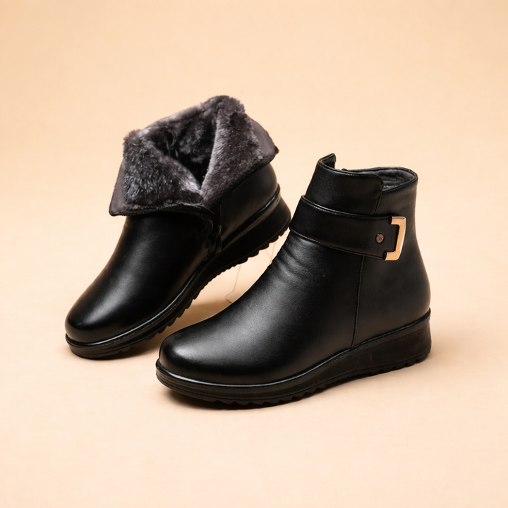 Women's non-slip winter boots for secure grip in cold weather. Cozy, warm ladies footwear with low heel.