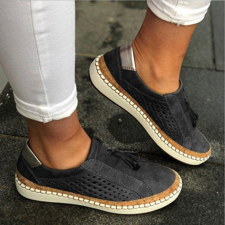 Women's orthopaedic comfort slippers with arch support, ideal for foot pain relief & casual wear.