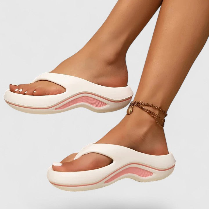 Orthopaedic women's slide sandals with superior arch support, offering ultimate comfort for daily wellness.