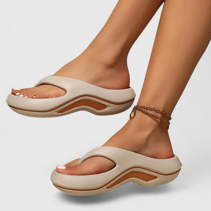 Lightweight women's casual slide sandals, perfect for summer, providing essential foot support & comfort.