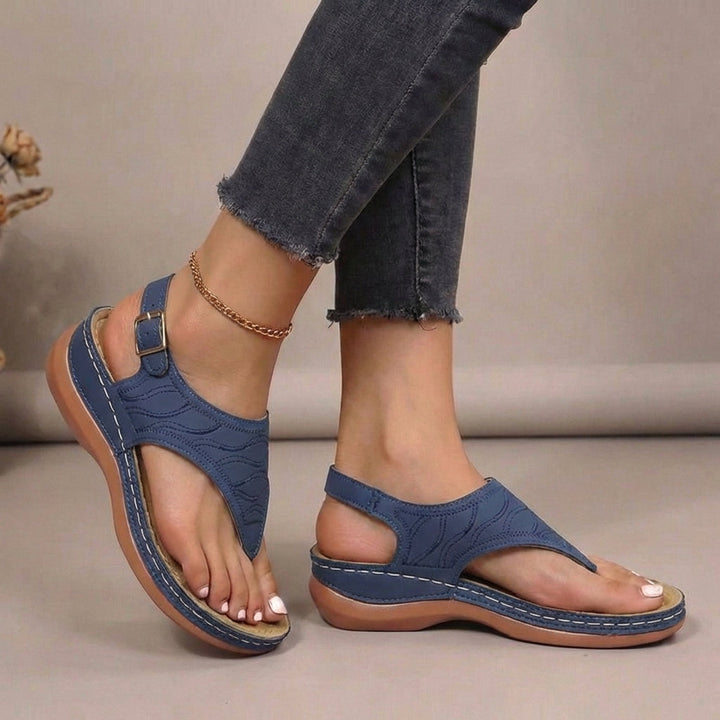 Supportive women's orthopaedic thong sandals with arch support, ideal for foot health and all-day comfort.
