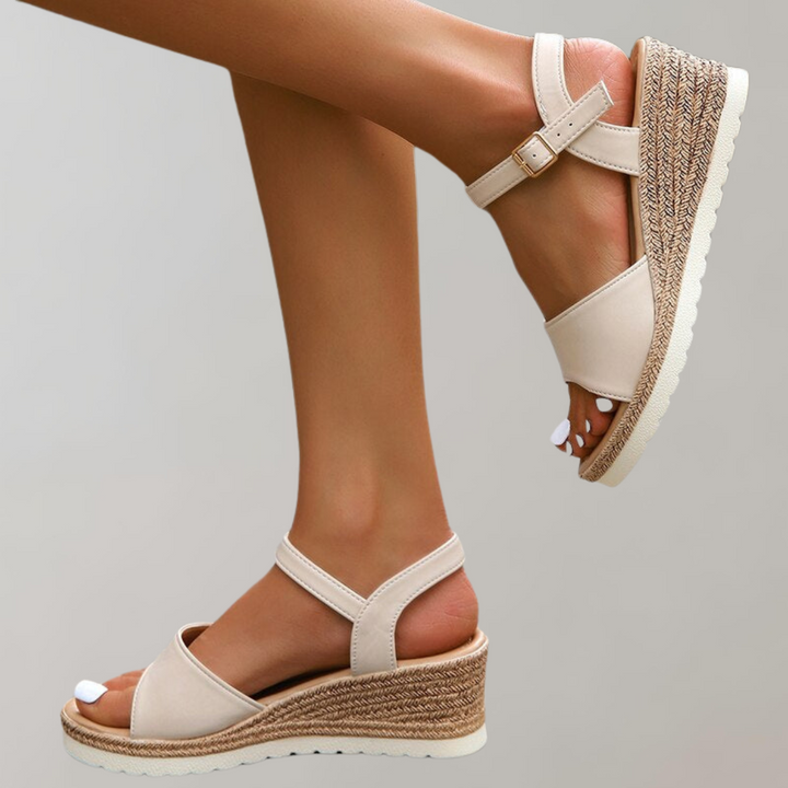 Beige women's orthopaedic wedge sandals featuring adjustable hook-and-loop straps for a secure, comfortable fit.