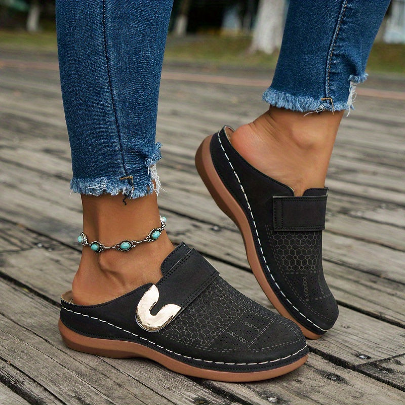 Women's comfortable orthopedic arch support slippers with a reliable non-slip sole for home.
