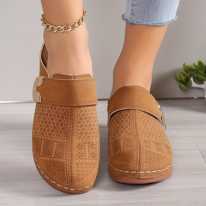 Women's indoor footwear: cozy orthopedic slippers with arch support and durable non-slip sole.