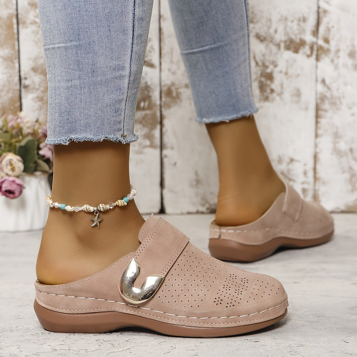 Supportive women's orthopedic slippers. Arch support and non-slip sole for cozy, safe daily wear.