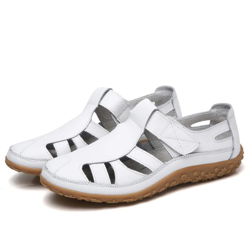 Women's orthopedic sandals for foot pain relief, featuring arch support & all-day balance.