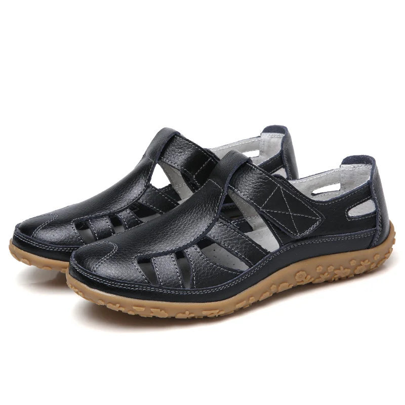 Side view: Stylish women's comfort sandals, highlighting adjustable straps & orthopedic design.