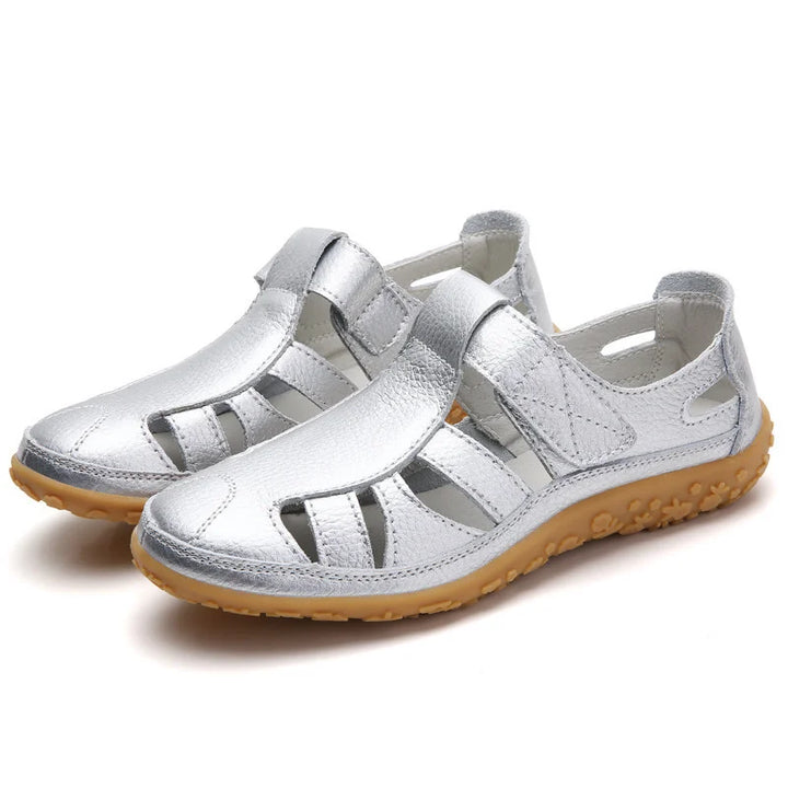 Close-up of anti-slip sole on women's orthopedic walking sandals for secure footing.