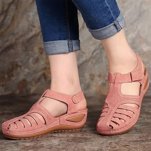 Stylish women's Roman sandals with orthopedic arch support for comfortable all-day wear. Adjustable fit.