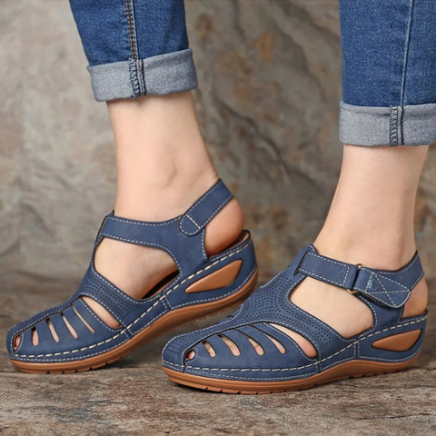Adjustable women's orthopedic Roman sandals, perfect for casual wear, offering superior comfort & support.