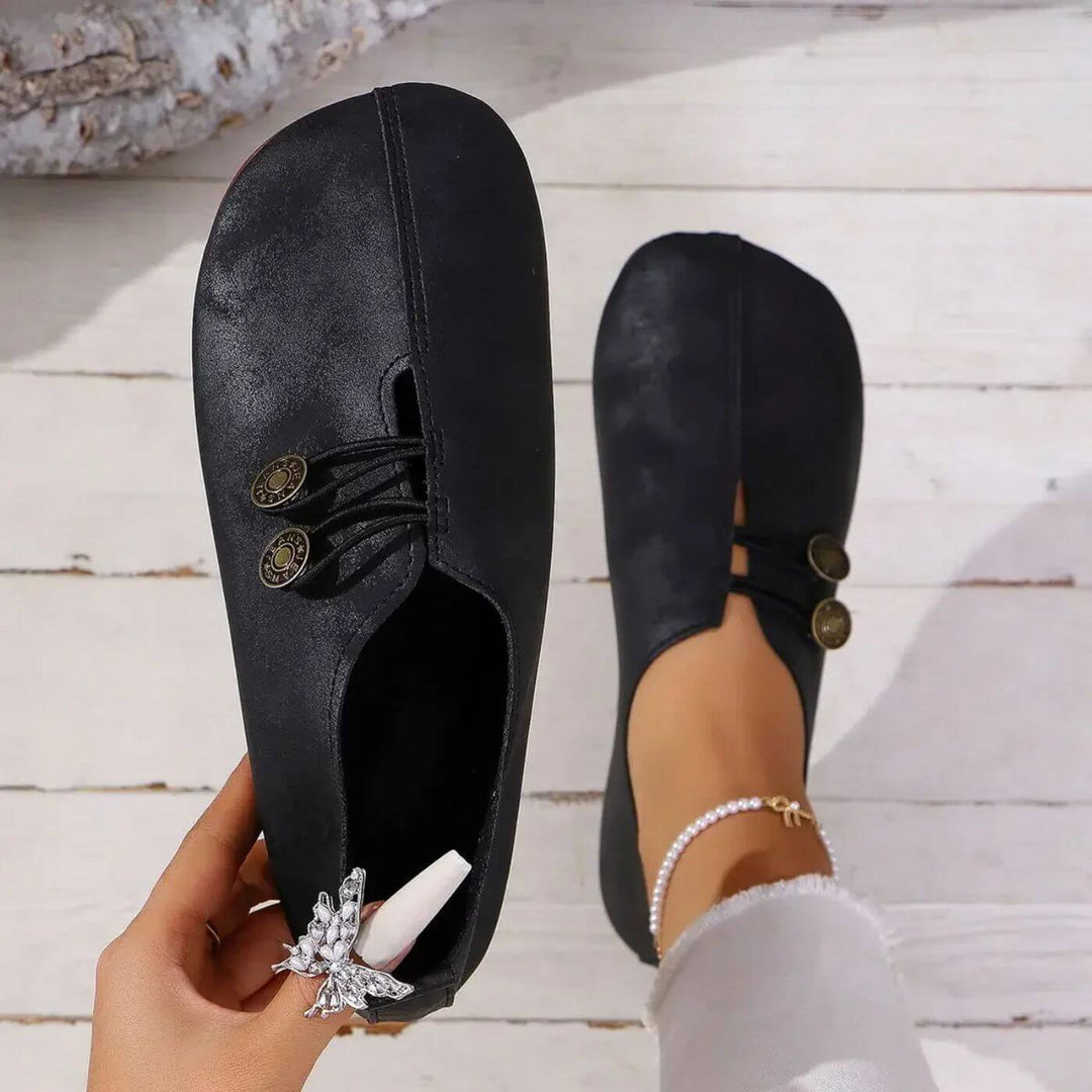 Blue women's walking orthopedic shoes with arch support, designed for cushioned comfort & foot health.